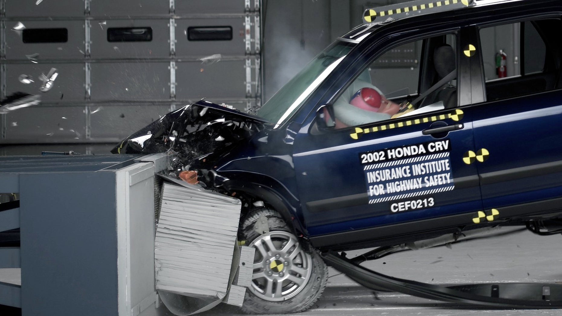 This undated photo provided by the Insurance Institute for Highway Safety shows a crash test of a 2002 Honda CR-V, one of the models subject to a recall to repair faulty air bags. The federal government is demanding that the auto industry recall millions of additional cars equipped with faulty air bags that can injure and even kill a driver. (AP Photo/Insurance Institute for Highway Safety)