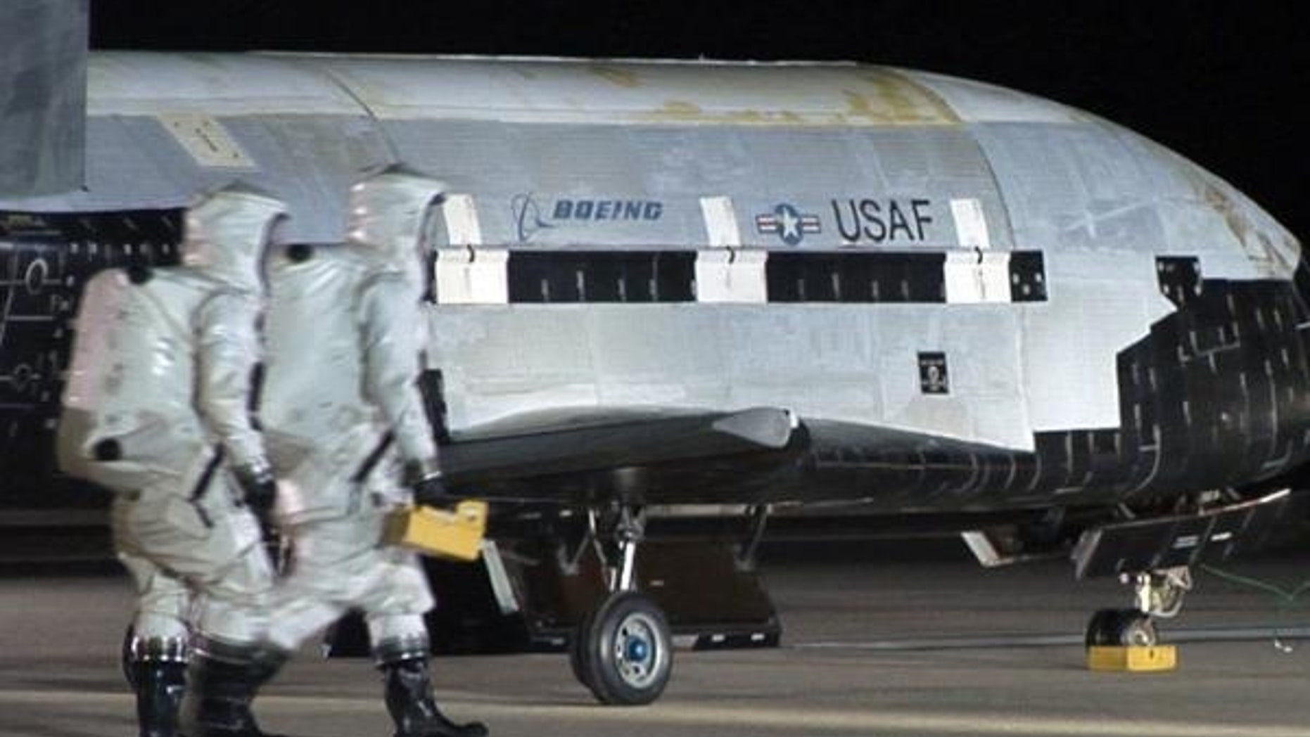 An Air Force X-37B robotic space plane is shown after it landed at Vandenberg Air Force Base in California. The fourth mission of the program is now underway and just passed 600 days in Earth orbit.