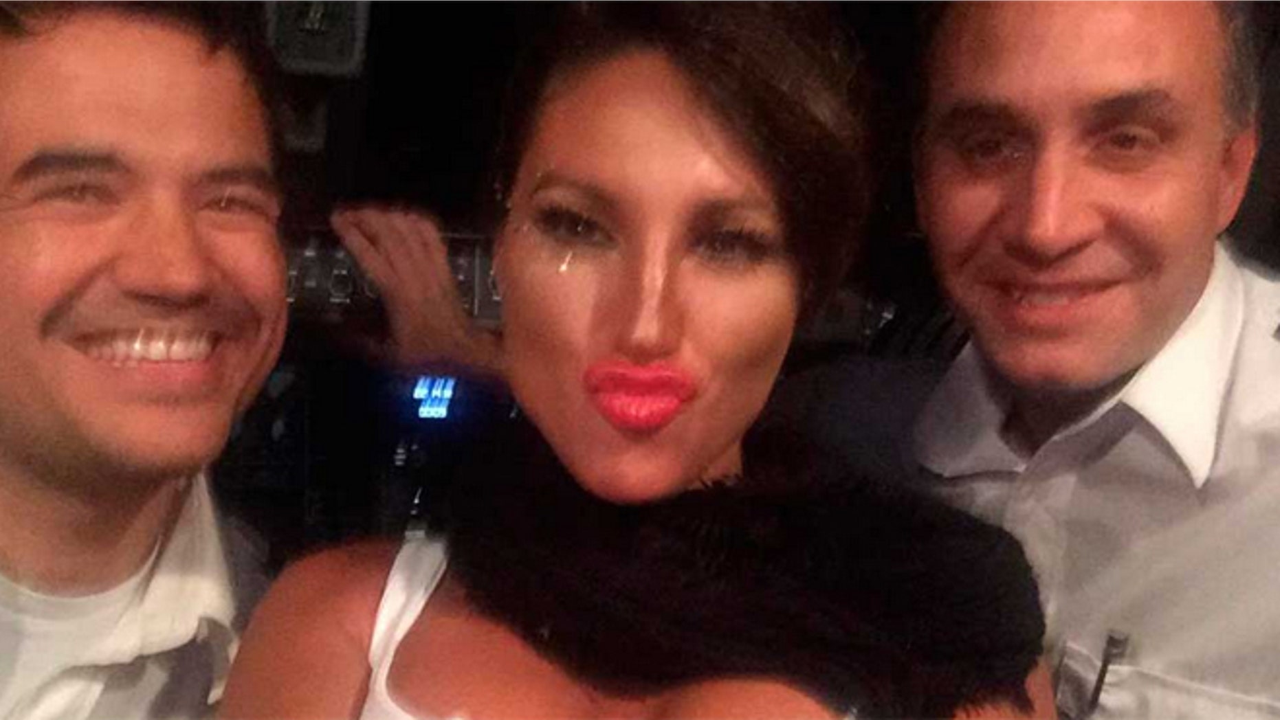 Victoria Xipolitakis (center) with the two fired Argentinean airline pilots. (Source: via Twitter)