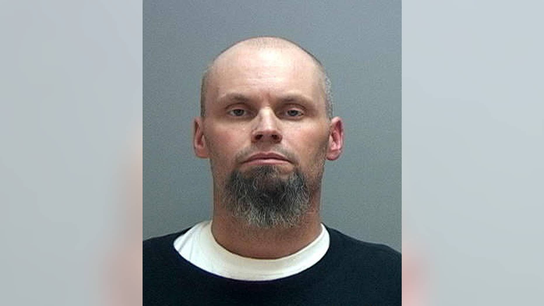 This Monday, April 27, 2015 booking photo provided by the Salt Lake County Sheriff shows Leo Greene, 39, of Salt Lake City. Greene has been arrested after crashing through a fence and sprinting from police onto a runway at the Salt Lake City airport early Monday, April 27, 2015. The 8-minute chase started on a public road near Salt Lake City International when an airport police officer tried to stop a car with its bumper dragging. The car took off, crashing through the fence lines and onto the tarmac area. The car then crashed into another fence and Greene jumped out and ran before being arrested. (Salt Lake County Sheriff via AP)
