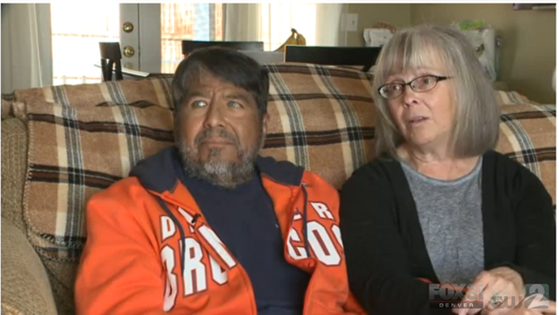 Al (left) and his wife Phyllis Velasquez (right) sit for an interview at their home in Littleton, Colorado. The couple, now facing Al's kidney failure, are no strangers to tragedy. Their son Kyle was a victim in the 1999 Columbine High School shooting.