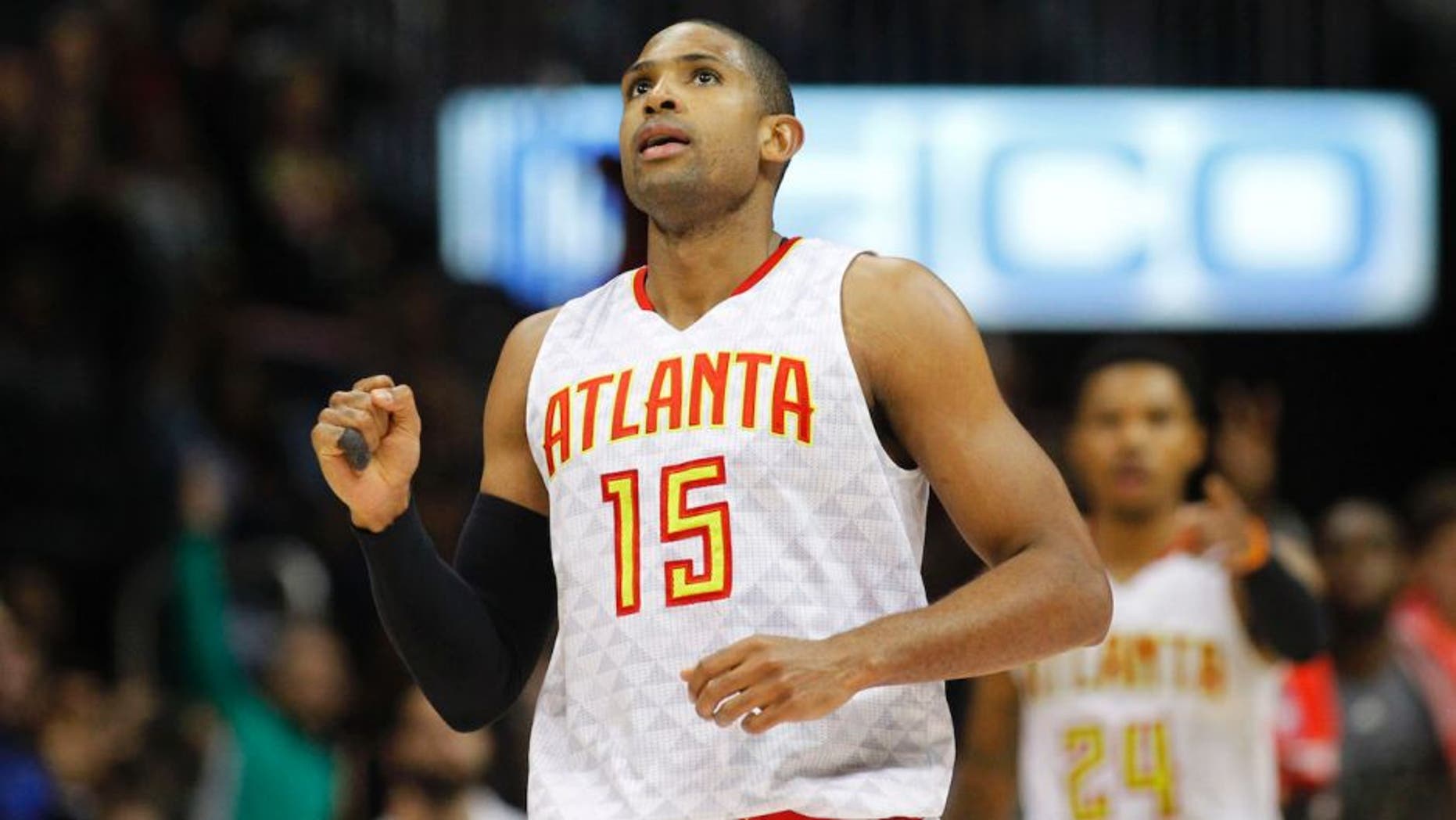 Feb 5, 2016; Atlanta, GA, USA; Atlanta Hawks center Al Horford (15) shows emotion after a made shot against the Indiana Pacers in the fourth quarter at Philips Arena. The Hawks defeated the Pacers 102-96. Mandatory Credit: Brett Davis-USA TODAY Sports