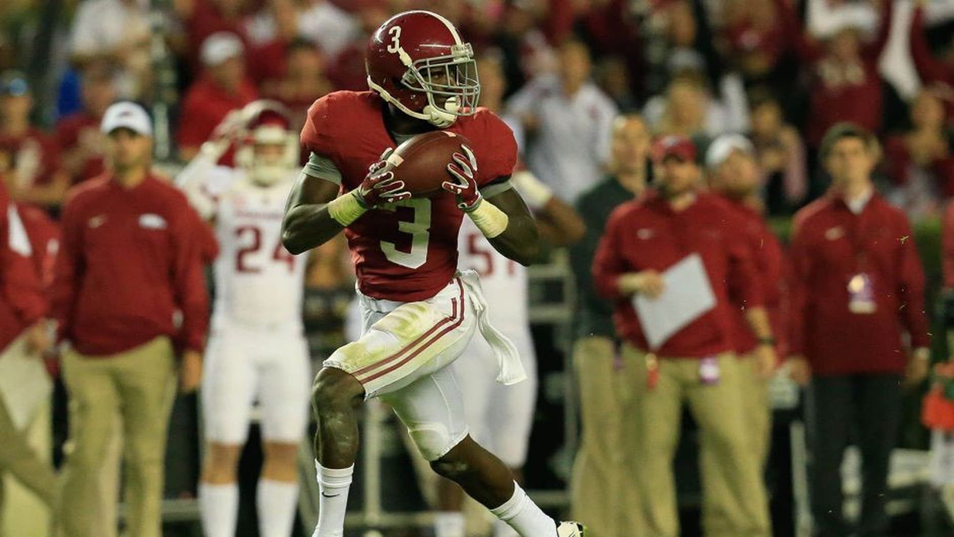 Oct 10, 2015; Tuscaloosa, AL, USA; Alabama Crimson Tide wide receiver Calvin Ridley (3) catches a touchdown pass against the Arkansas Razorbacks at Bryant-Denny Stadium. Mandatory Credit: Marvin Gentry-USA TODAY Sports