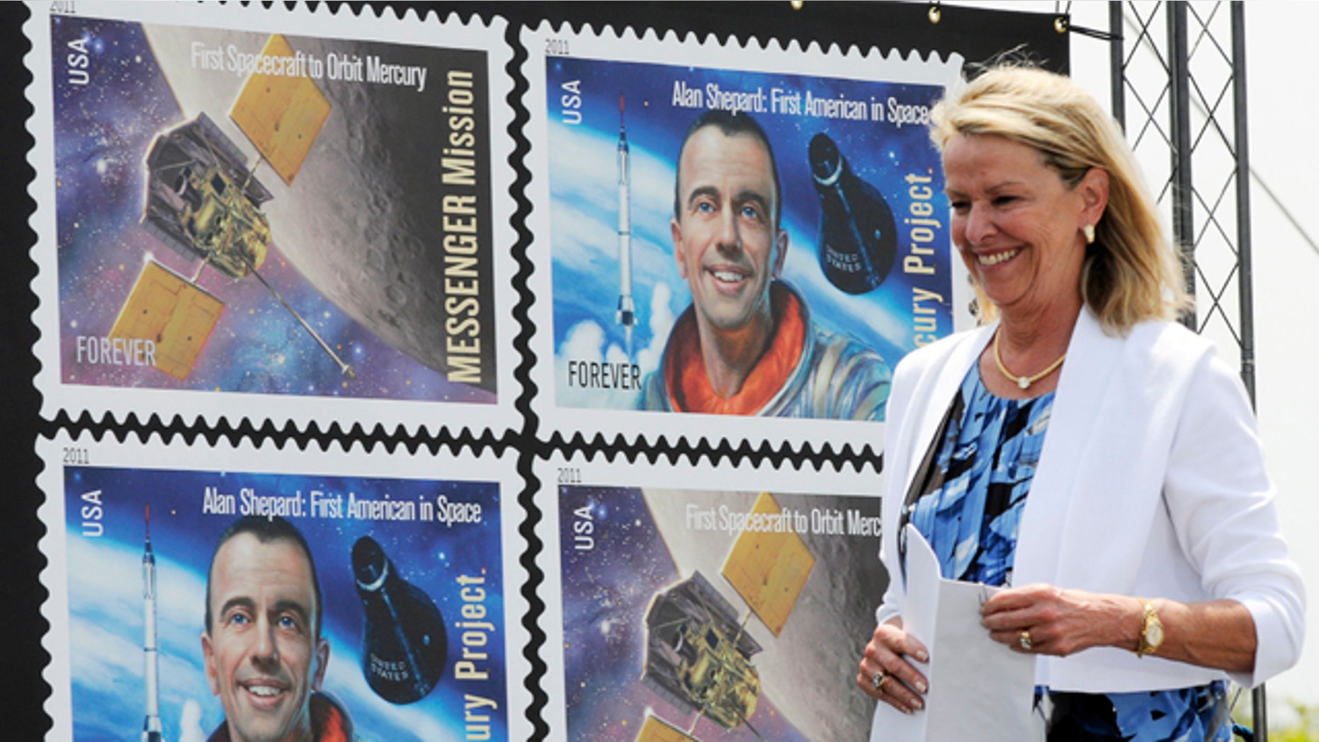 May 4, 2011: Julie Jenkins, daughter of Alan Shepard, attends the dedication ceremony of Mercury Project/Messenger Mission stamp at Kennedy Space Center Visitor Complex. The Postal Service dedicated the stamp to mark the 50th anniversary of Shepard's suborbital flight, Freedom 7.