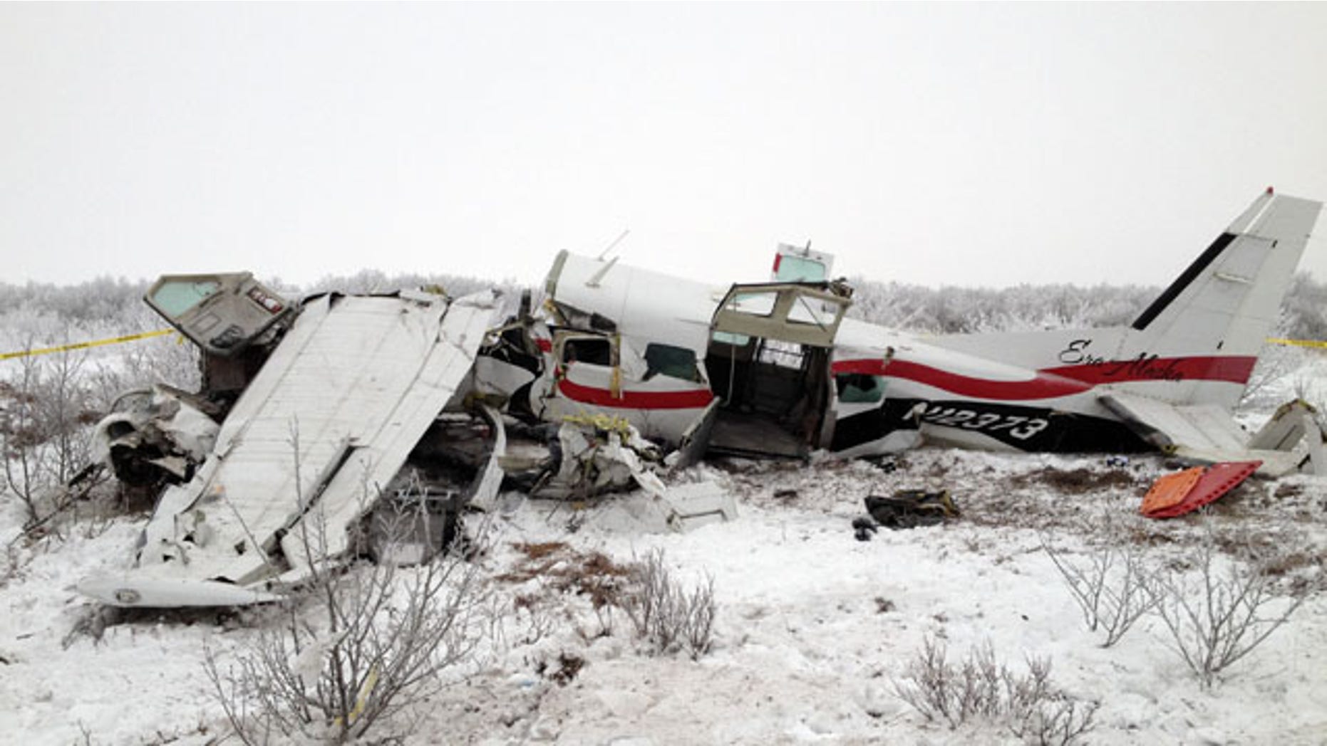 November 30, 2013: This image courtesy of Alaska State Troopers shows the wreckage of a plane that crashed Friday near St. Marys, Alaska. Authorities said the pilot and three passengers died in this crash of the single-engine turboprop Cessna 208. Few other details, including the possible cause of the crash, are known. (AP Photo/Alaska State Troopers)