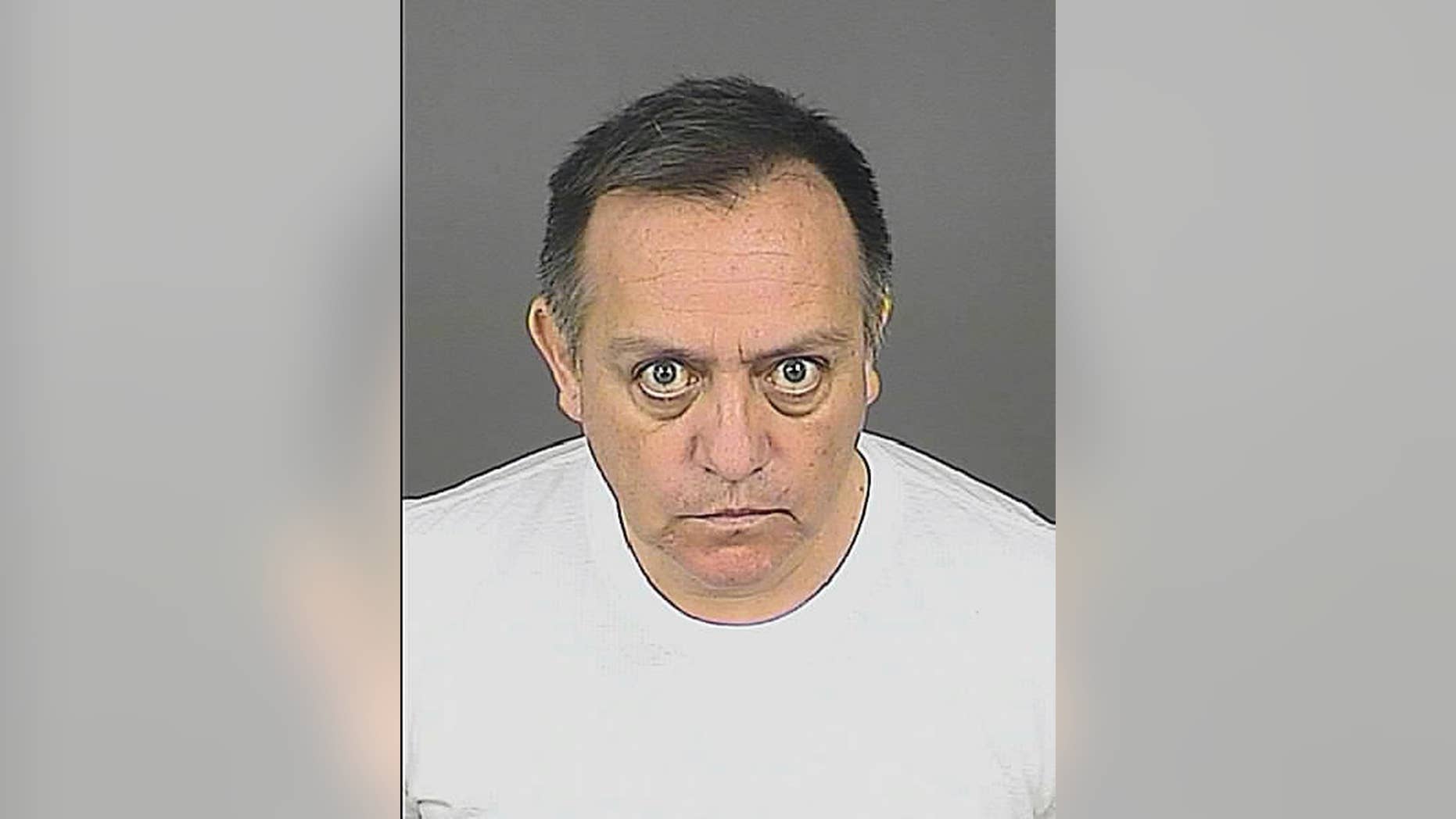 This Wednesday, Aug. 26, 2015 booking photo provided by the Denver District Attorney’s Office shows Jason Martinez who was booked Wednesday on a no-bond hold. Martinez a former Albuquerque, New Mexico, school administrator who faces child sex abuse charges in Colorado has been booked into a Denver jail a day after a judge issued a warrant for his arrest. (Denver District Attorney’s Office via AP)