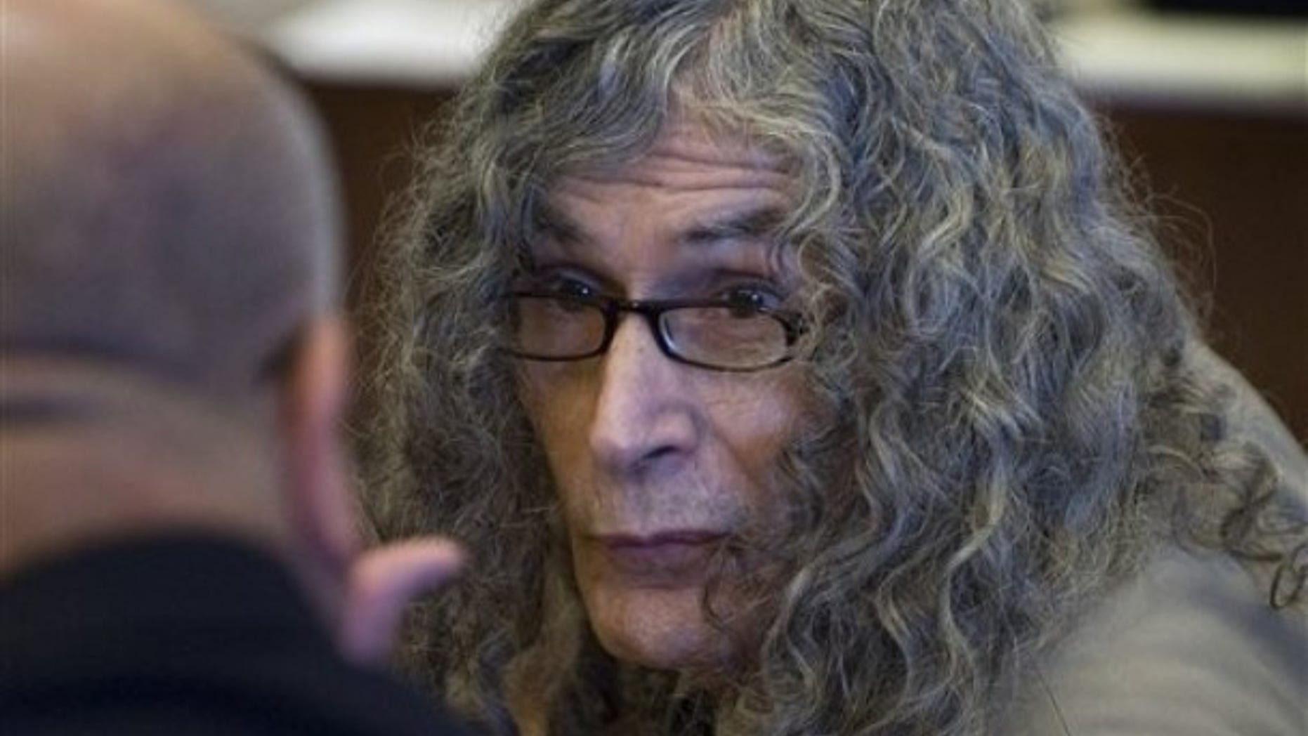 Rodney Alcala talks with his investigator before being convicted in Santa Ana, Calif. on Feb. 25, 2010, of murdering a 12-year-old girl and four women in the late 1970s (AP).