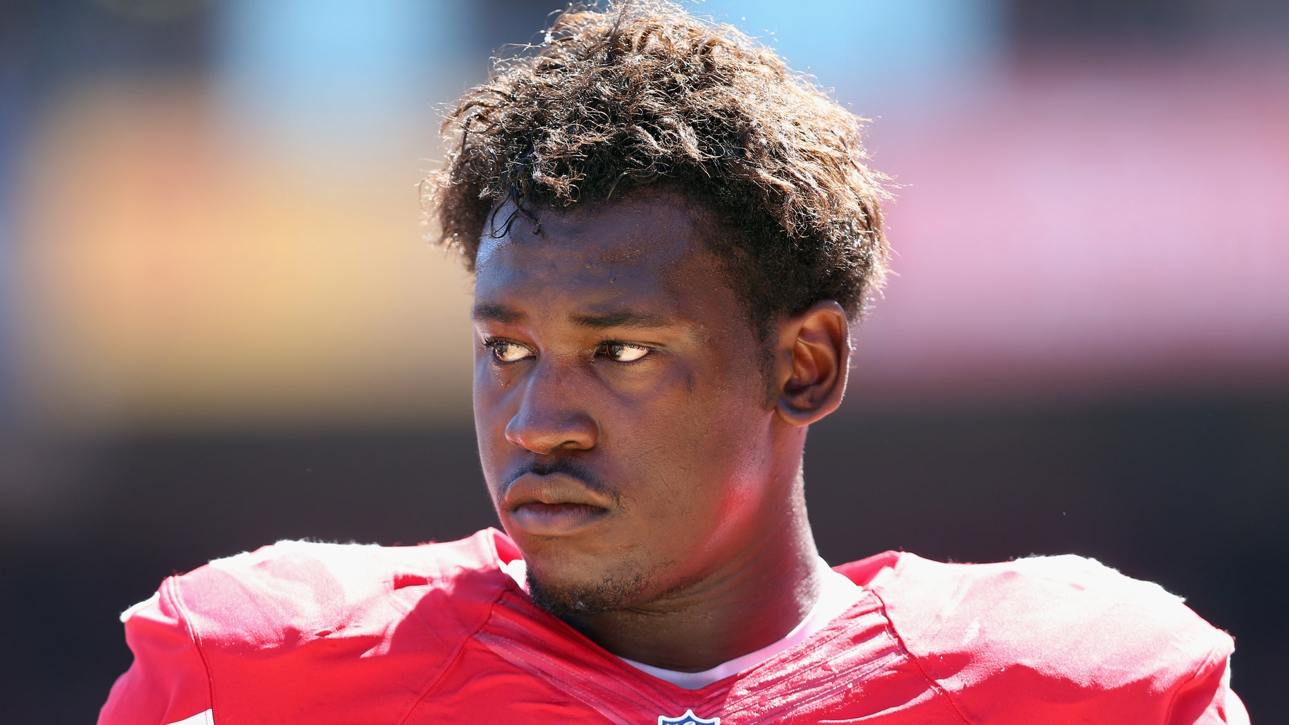 Linebacker Aldon Smith #99 of the San Francisco 49ers looks on against the Green Bay Packers at Candlestick Park on September 8, 2013 in San Francisco, California. (Photo by Jeff Gross/Getty Images)