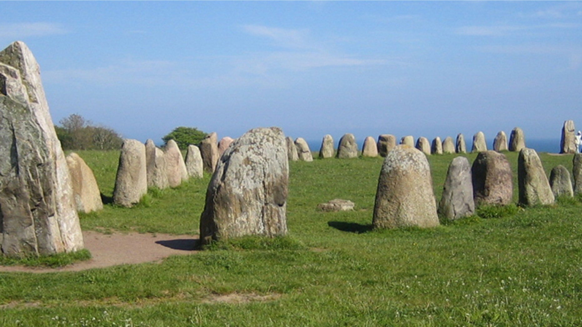 Ale's Stones, a megalithic monument in southern Sweden, resembles a stone ship built of 59 large sandstone boulders, weighing up to 1.8 tons each.