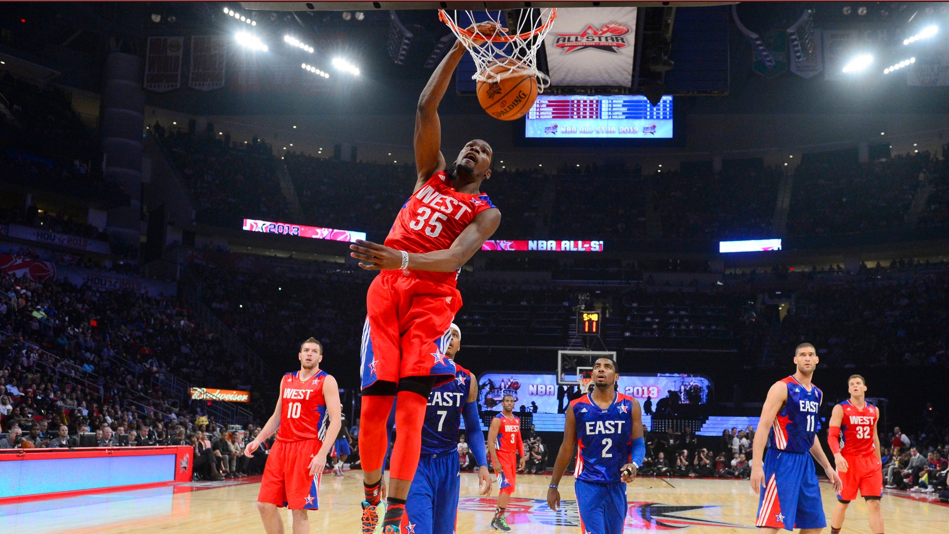 West Team's Kevin Durant of the Oklahoma City Thunder dunks during the first half of the NBA All-Star basketball game Sunday, Feb. 17, 2013, in Houston. (AP Photo/Bob Donnan, Pool)