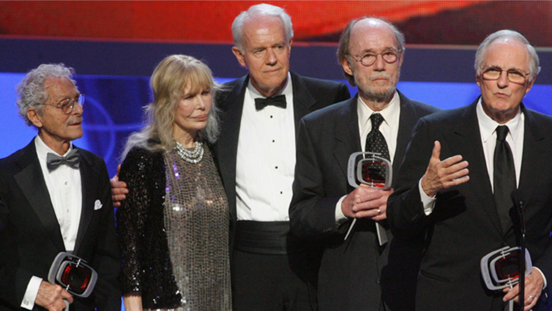 Cast members of "M*A*S*H*" (L-R) Allan Arbus, Loretta Swit, Mike Farrell, Burt Metcalfe and Alan Alda accept the Impact award at the taping of the seventh annual TV Land Awards in Los Angeles, California April 19, 2009.