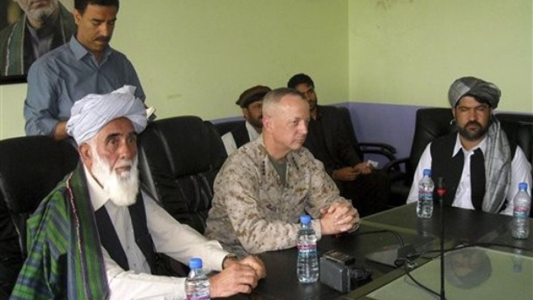 June, 8, 2012: The commander of US and NATO troops in Afghanistan, US Marine Lt. General John Allen, center, meets with the Governor of Logar Province, Allhaj Mohammad Tahir Sabari, left, south of Kabul, Afghanistan.