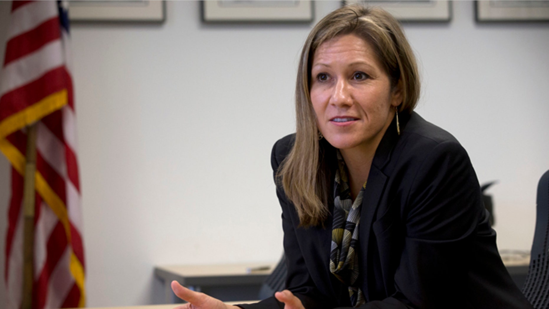 In this photo taken April 30, 2014, Amanda Renteria is interviewed in Washington.