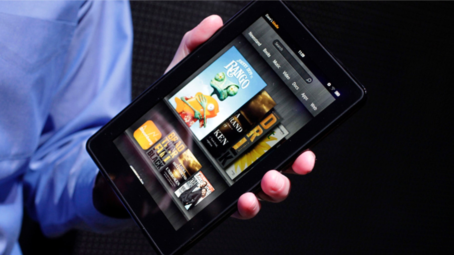 The original Kindle Fire is introduced at a news conference in New York on Sept. 28, 2011. Amazon.com quenched the Kindle Fire on Aug. 30, 2012, saying its first tablet computer is now sold out. The Internet retailer is widely expected to reveal a new model of the Fire Thursday.