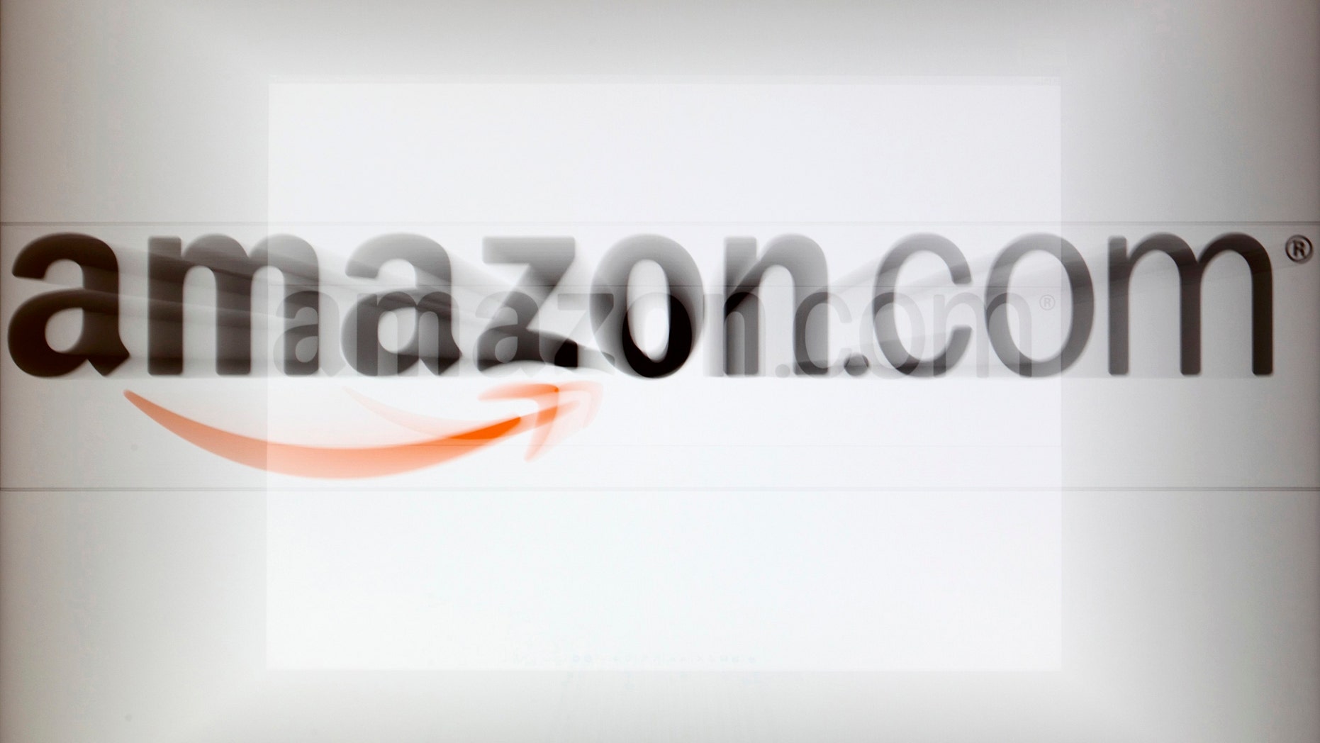 A zoomed image of a computer screen showing the Amazon logo is seen in Vienna November 26, 2012. To match Special Report TAX-AMAZON/ REUTERS/Heinz-Peter Bader (AUSTRIA - Tags: POLITICS BUSINESS) - RTR3B9FF