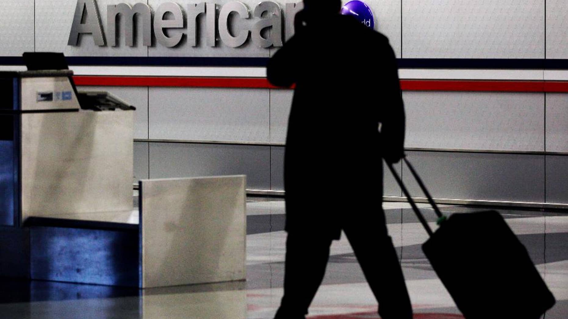 American and US Airways announced changes to their policies on checked-bag fees and redeeming miles for free flights.