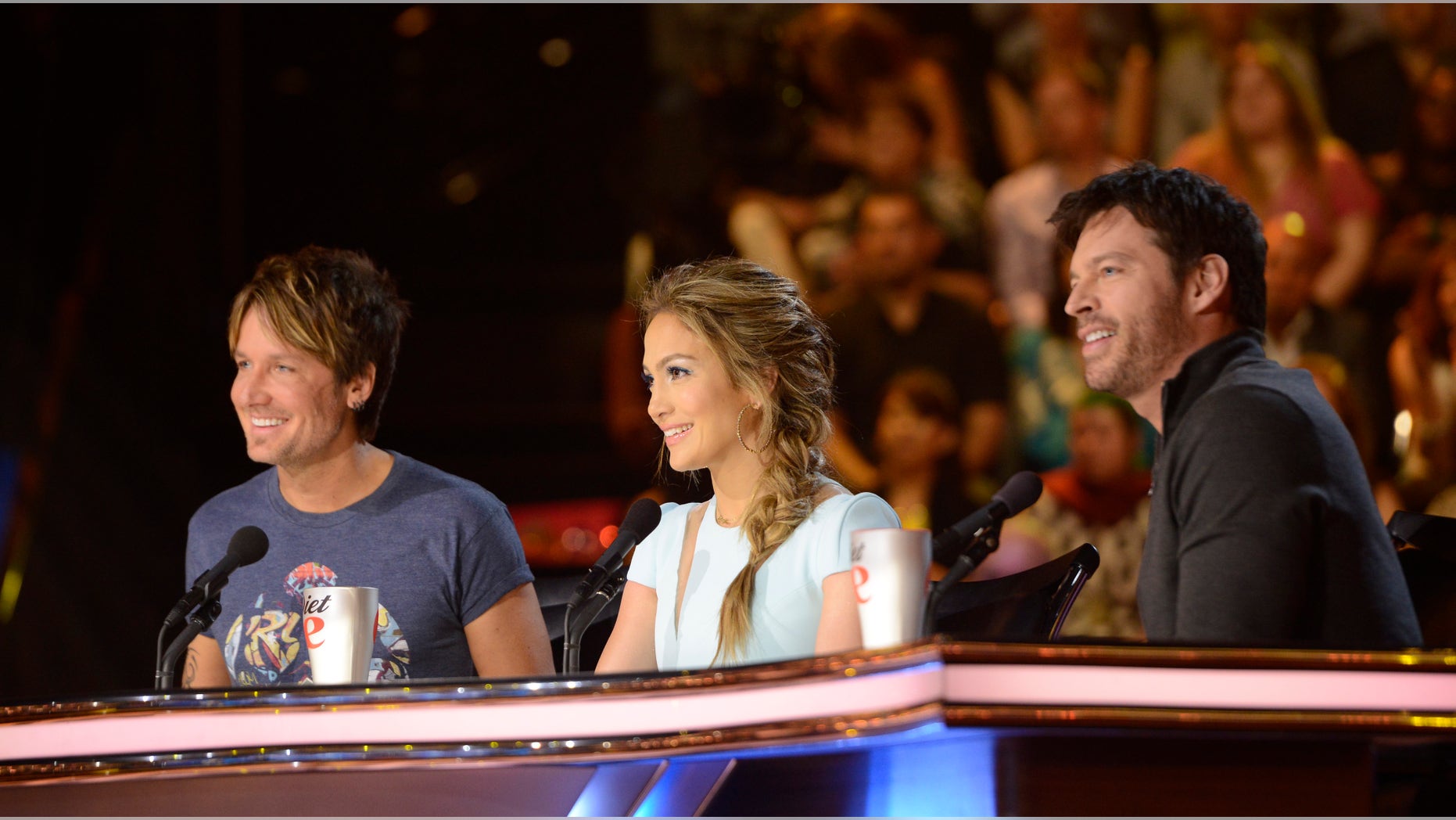 AMERICAN IDOL XIII: L-R: Keith Urban, Jennifer Lopez and Harry Connick, Jr. on AMERICAN IDOL XIII airing Wednesday, March 19 (8:00-10:00 PM ET / PT) on FOX. CR: Michael Becker / FOX. Copyright 2014 / FOX Broadcasting.