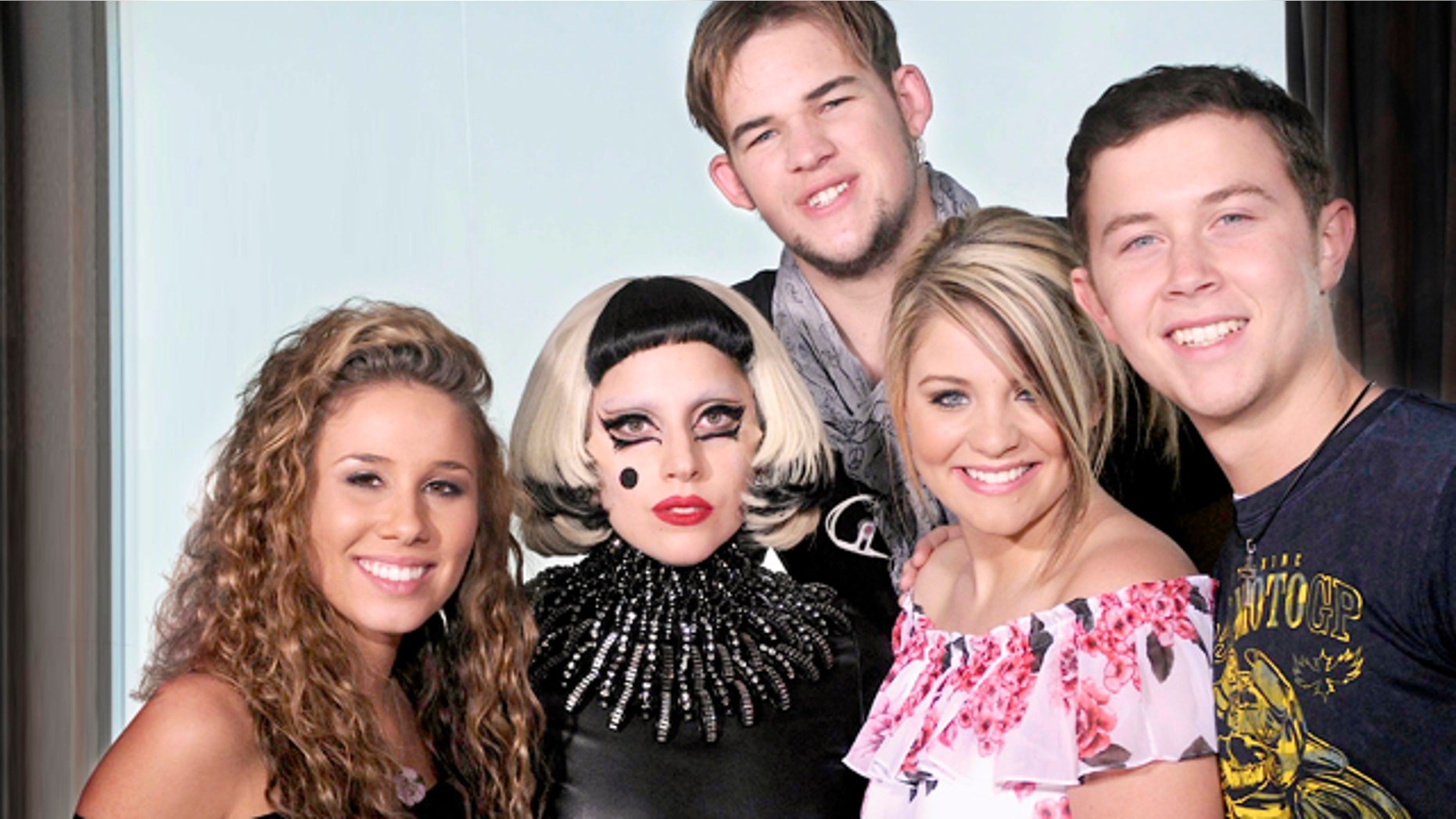 May 11: In this publicity image released by Fox, Lady Gaga, center, poses with the final four contestants, from left, Haley Reinhart, James Durbin, Lauren Alaina and Scotty McCreery from the singing competition series "American Idol" in Los Angeles.