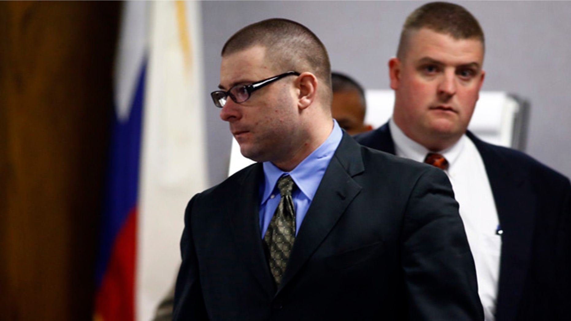 Feb. 18, 2015: Eddie Ray Routh, center, enters the courtroom following a break in his capital murder trial at the Erath County, Donald R. Jones Justice Center in Stephenville, Texas.