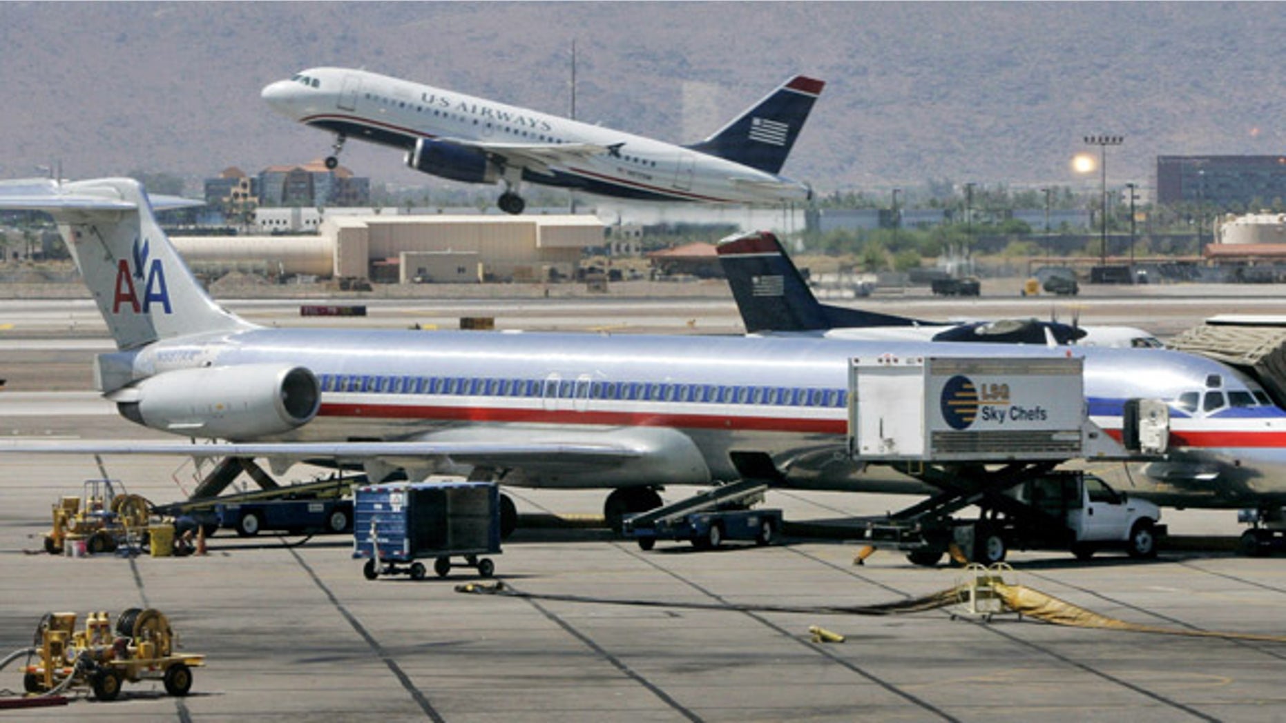 An American Airlines and a US Airways plane.
