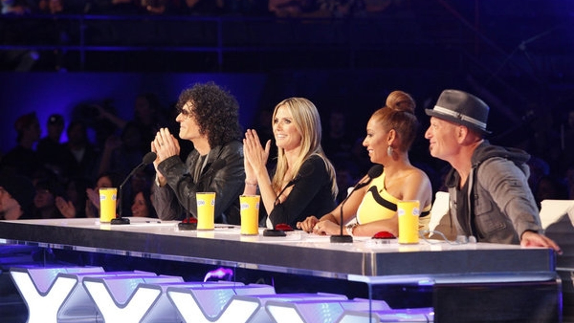 "America's Got Talent" judges (left to right) Howard Stern, Heidi Klum, Mel B and Howie Mandel are shown.