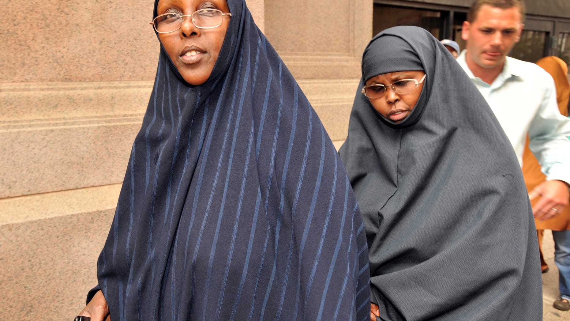 August 5, 2010: Hawo Mohamed Hassan, left, and Amina Farah Ali, both of Rochester, Minnesota, leave the U.S. District Court after appearing at a hearing in St Paul.
