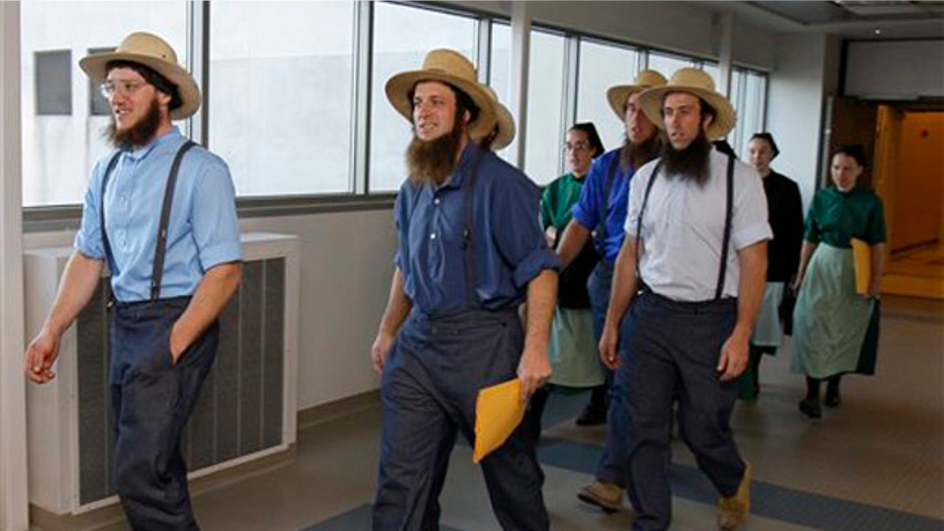 April 19, 2012: Members of the Amish community leave the U.S. Federal Courthouse in Cleveland.