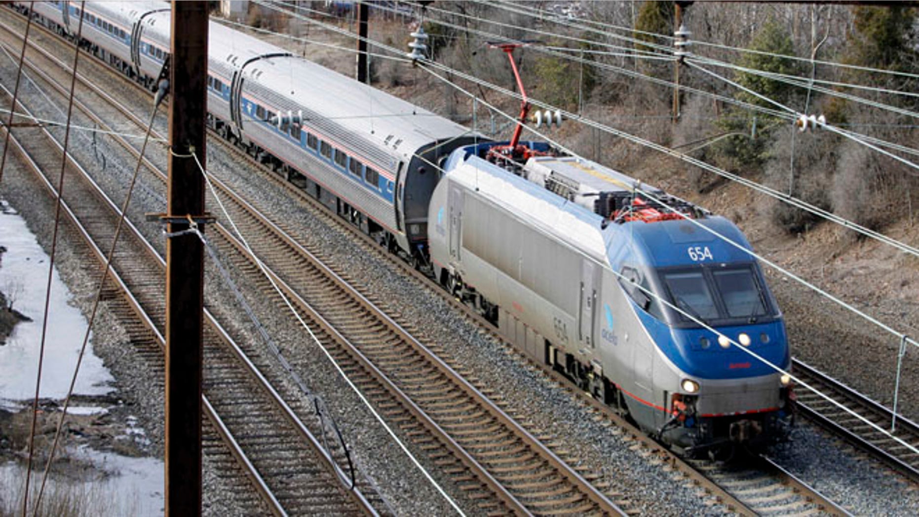 In this Jan. 5, 2010, file photo, a northbound Amtrak Acela passes through Middle River, Md.