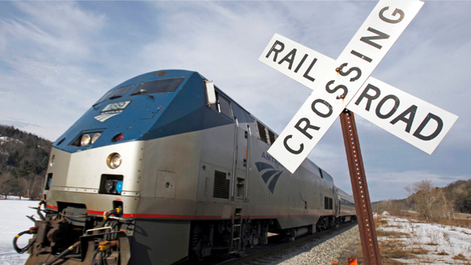 In this March 11, 2013 photo, the Amtrak Vermonter heads south in Middlesex, Vt. Amtrak says ridership has increased in the first six months of fiscal year 2013, with ridership in March setting a record as the single best month ever in Amtrak's history.