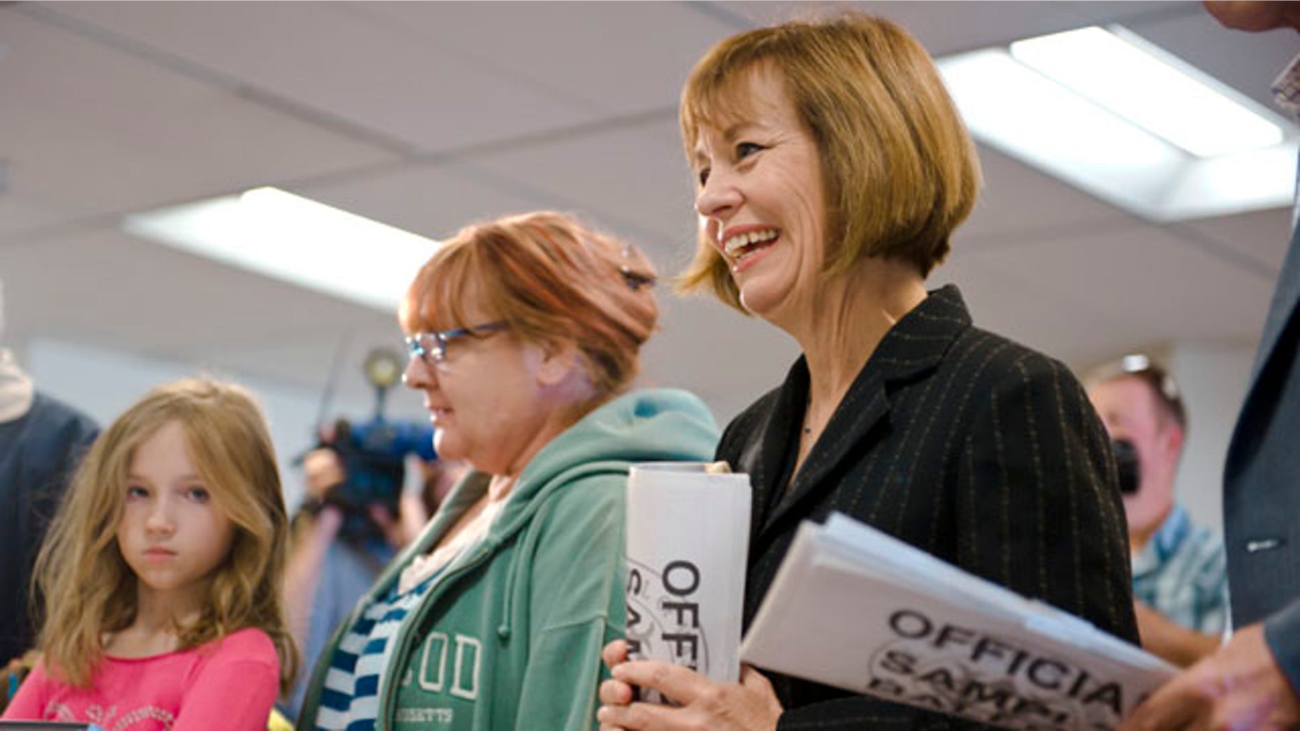 Nevada Republican Senate candidate Sharron Angle gets in line to cast her vote in Reno, Nev.
