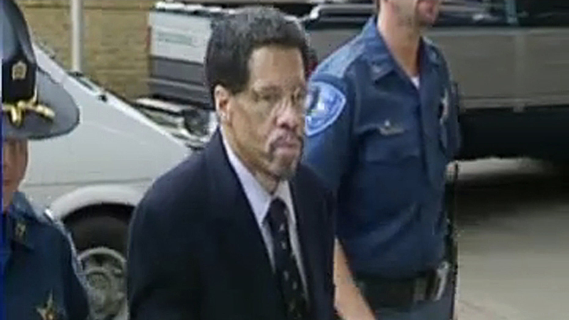 Feb. 12, 2015: In this image made from video and released by WBRZ-TV in Baton Rouge, Albert Woodfox walks into a courthouse in Louisiana. A federal appeals court on Tuesday temporarily blocked the release of Woodfox, the last of the Angola Three inmates who spent decades in isolation after forming a Black Panther Party to protest prison conditions. (WBRZ-TV via AP)