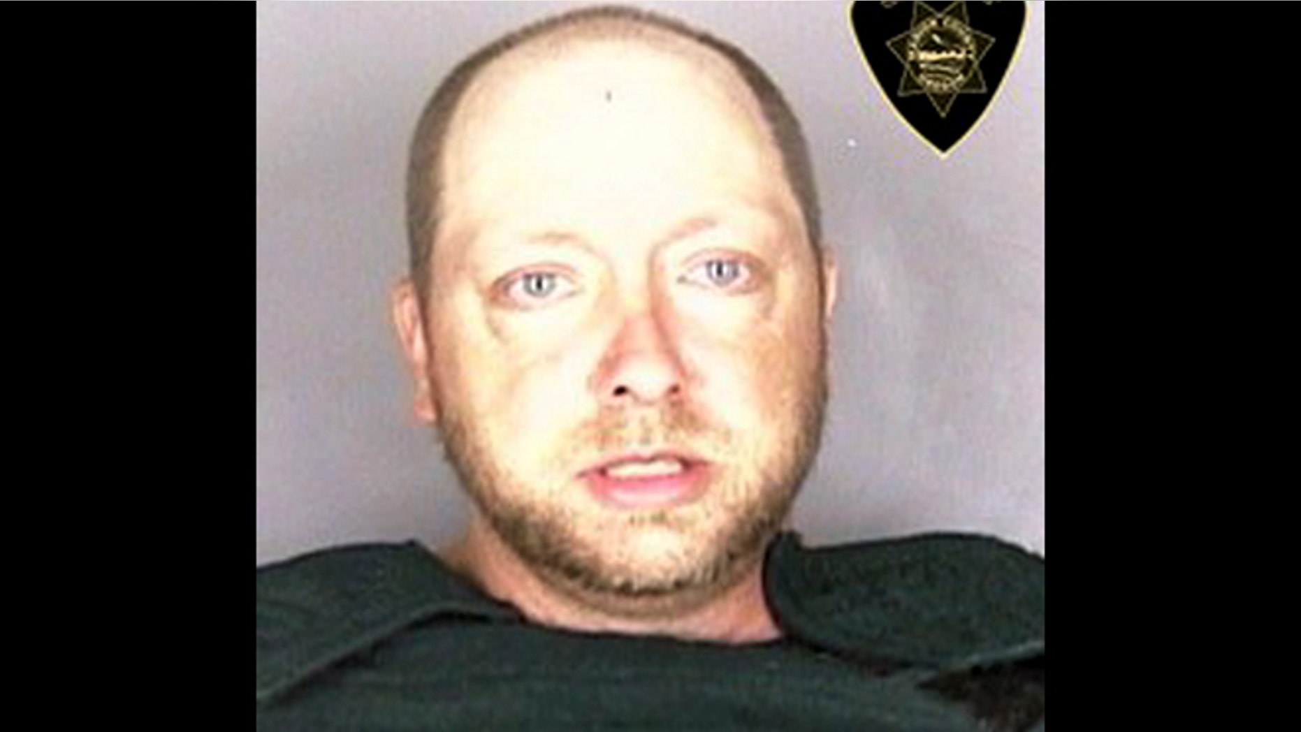 This undated photo released by the Marion County Sheriff's Office shows Anthony McGuire. Authorities arrested McGuire, a Salem, Oregon man accused of impersonating a sheriff's deputy while taking an SUV for a test drive.