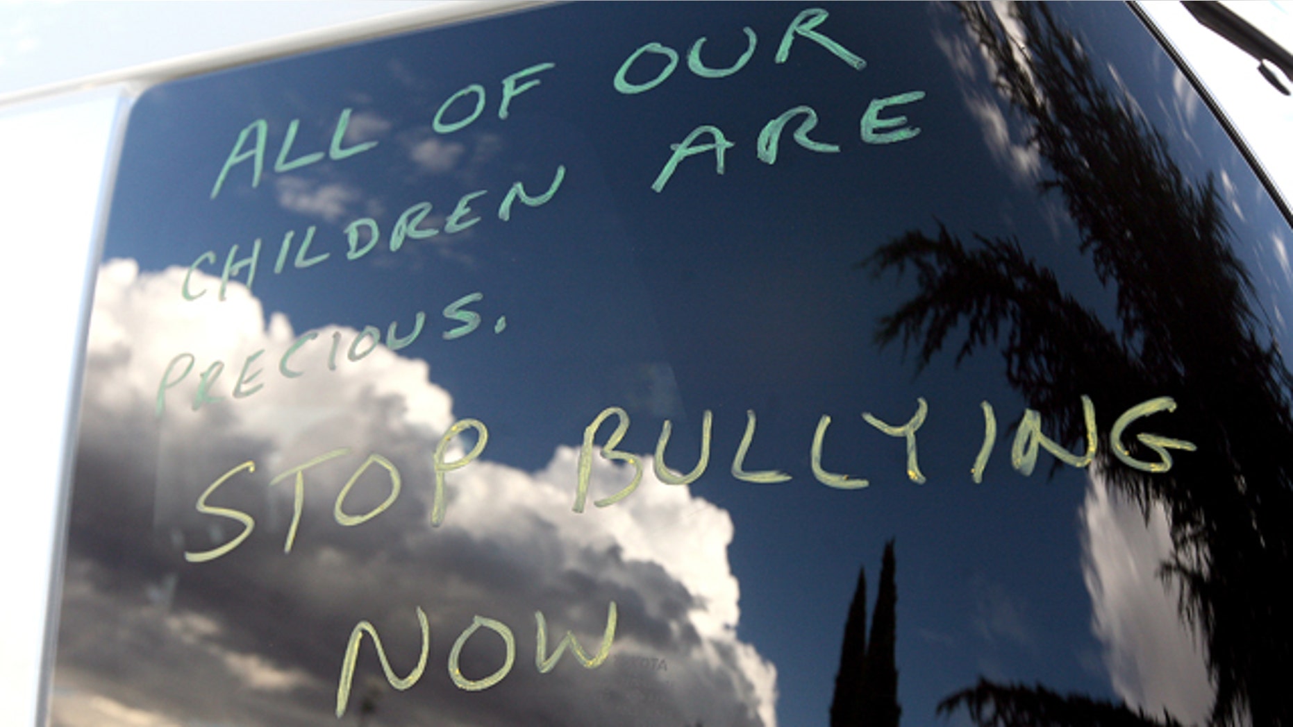 This Oct. 1, 2010 photo shows a message written on a vehicle window at Seth Walsh's memorial service at the First Baptist Church in Tehachapi, Calif. The gay teen, who police determined was bullied for at least the past two years, was found Sept. 19, 2010 by his family, unconscious after he hanged himself from a tree in their backyard, according to police reports. He died the next day. A spate of teen suicides linked to anti-gay harassment is prompting school officials nationwide to rethink their efforts against bullying _ and in the process, risk entanglement in a bitter ideological debate. The conflict: Gay-rights supporters insist that any effective anti-bullying program must include specific components addressing harassment of gay youth. But religious conservatives condemn that approach as an unnecessary and manipulative tactic to sway young people's views of homosexuality. (AP Photo/The Bakersfield Californian, Henry A. Barrios)