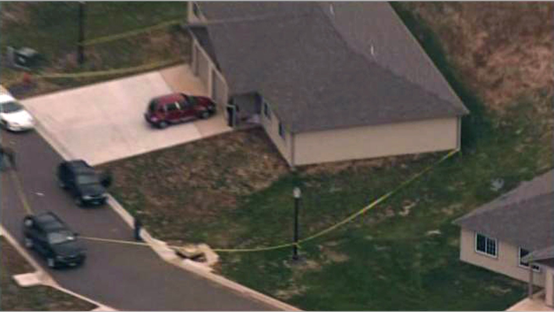 Nov. 30: This frame grab photo from a video provided by KSDK, TV-5, St. Louis, shows the scene in Bonne Terre, Mo., where four people were found dead. St. Francois County Coroner Jim Coplin says a man shot the other three people, then himself.