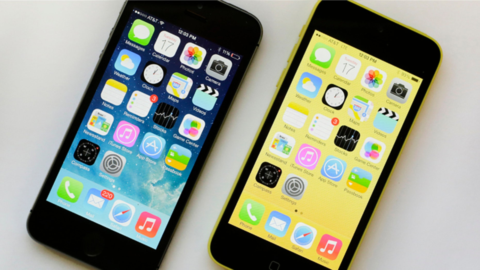 Sept. 17, 2013: The iPhone 5S, left, 5S offers a fingerprint sensor, a better camera and a faster processor, while the iPhone 5C, right, is largely last years iPhone 5 with a plastic back and a choice of five colors.
