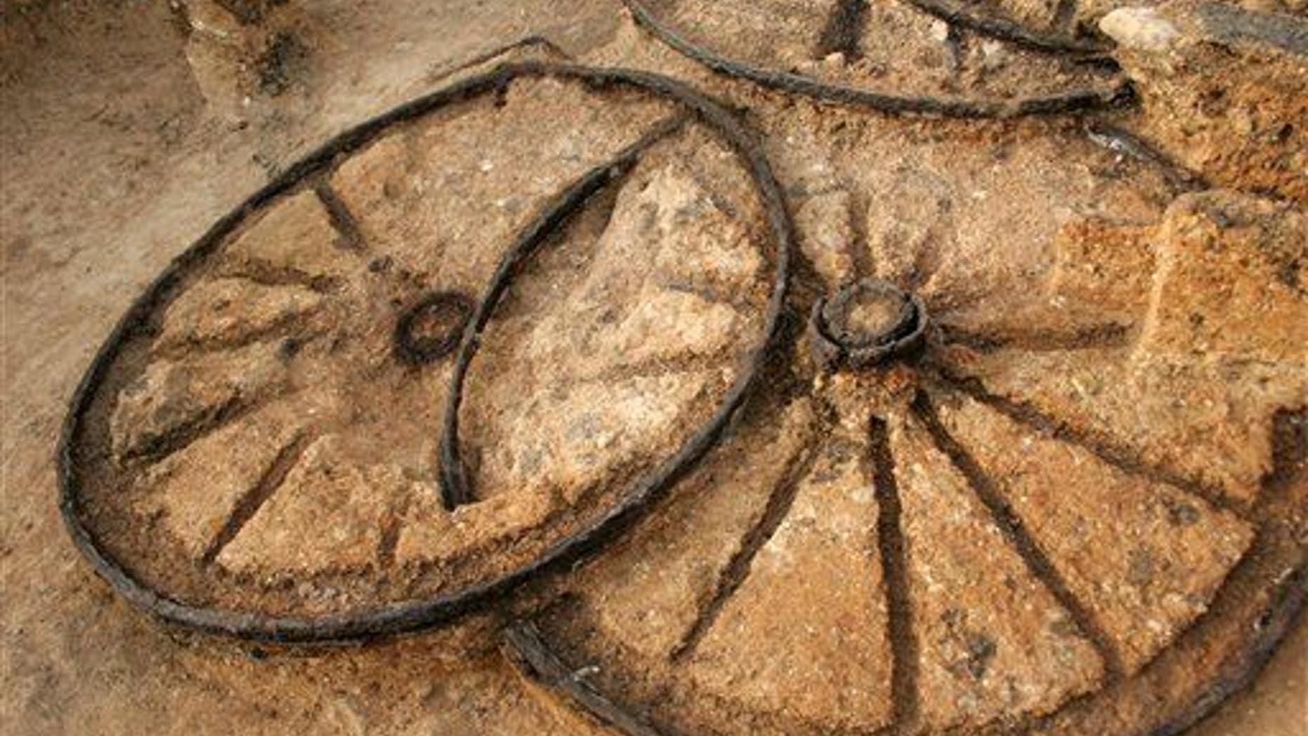 Parts of a different 1,800-year-old bronze chariot, seen, at an ancient Thracian tomb near the village of Karanovo, east of the Bulgarian capital Sofia, Friday, Nov. 21, 2008.
