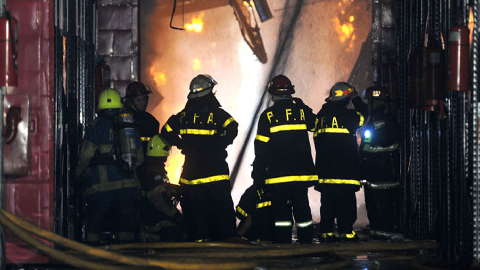 Feb. 5, 2014: Firefighters work to extinguish a fire at the Iron Mountain warehouse in Buenos Aires, Argentina.