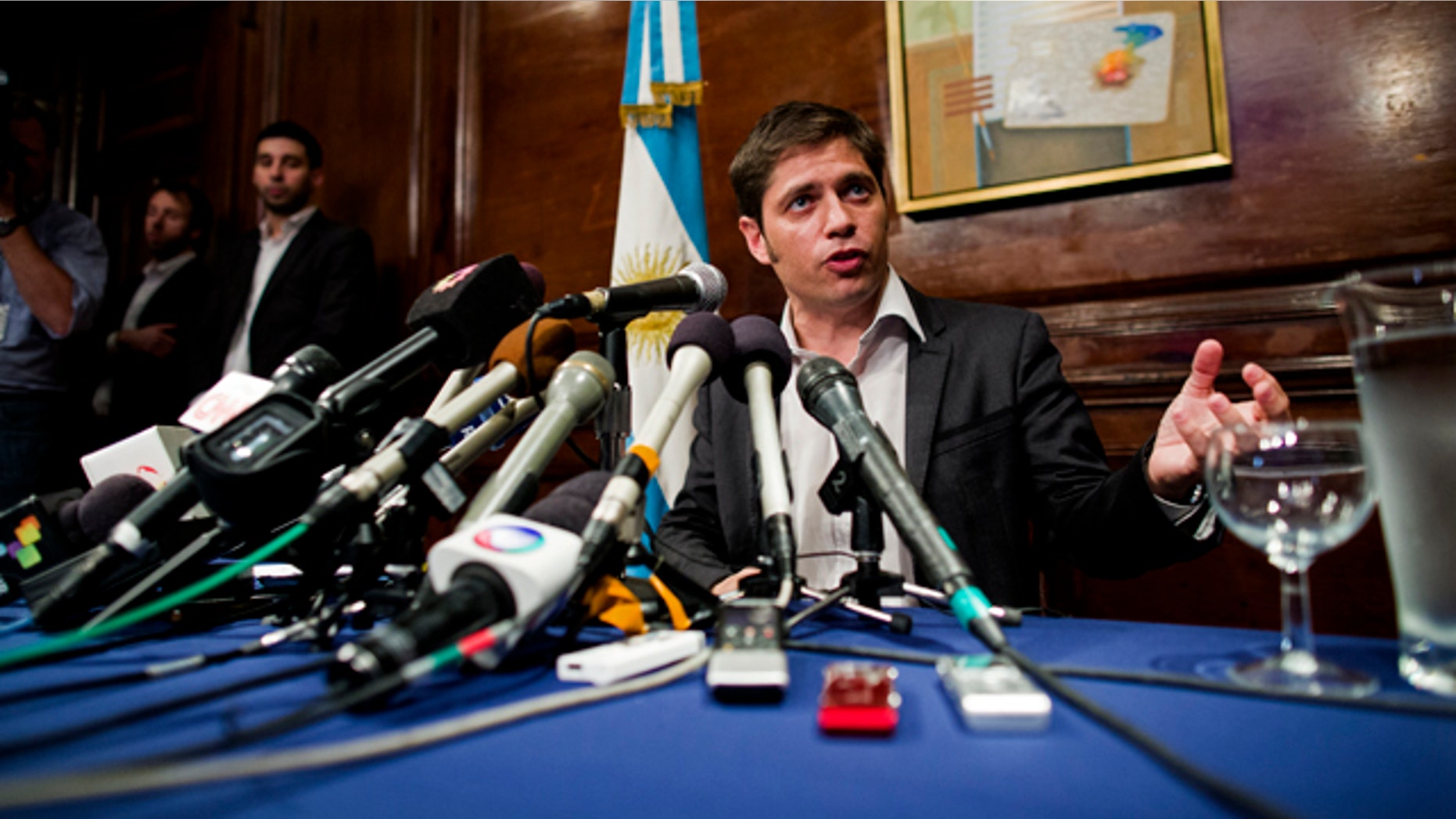July 30, 2014: Axel Kicillof, Argentina's economy minister, addresses members of the news media after a negotiation session in New York. (AP Photo/Craig Ruttle)