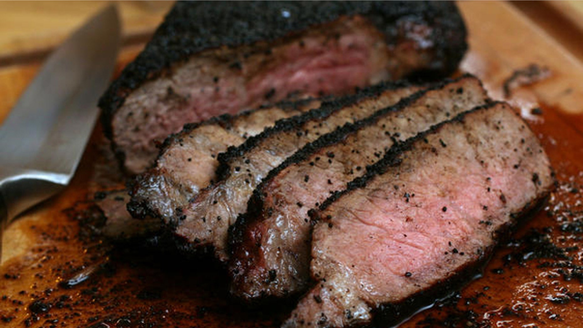** FOR USE WITH AP WEEKLY FEATURES ** Moderate amounts of lean beef can have a place in a healthy diet. Coffee-and cocoa-encrusted sirloin, shown in this May 1, 2007 photo, uses a lean cut of beef and should not be cooked past medium to prevent it from drying out. (AP Photo/Larry Crowe)