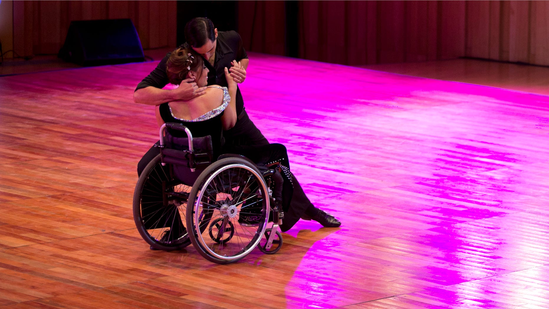 Argentine dancers Gabriela Fernanda Torres and Pablo Rafael Pereyra, compete in the stage category at the World Tango Championship in Buenos Aires, Argentina, Friday, Aug. 21, 2015. Torres says she doesnât want special treatment, and hopes the judges to evaluate the couple as artists. If they are chosen, they will move on to the semi-finals. (AP Photo/Natacha Pisarenko)