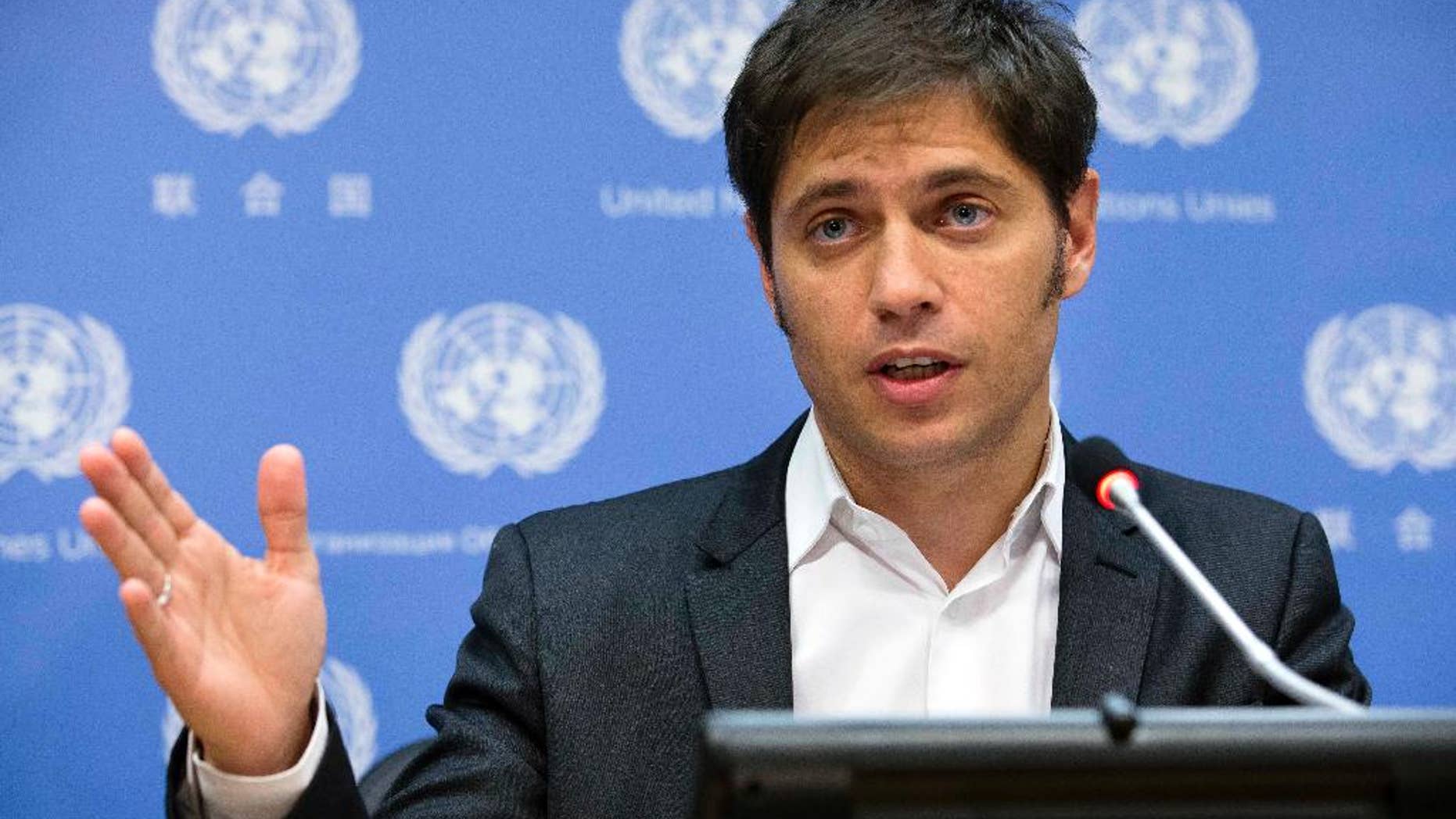 Argentine Economic Minister Axel Kicillof speaks during a news conference at United Nations headquarters, Wednesday, June 25, 2014. The winners of a decade-long debt battle asked a U.S. judge on Tuesday to deny Argentina's request for more negotiating time to avoid a catastrophic default. (AP Photo/John Minchillo)