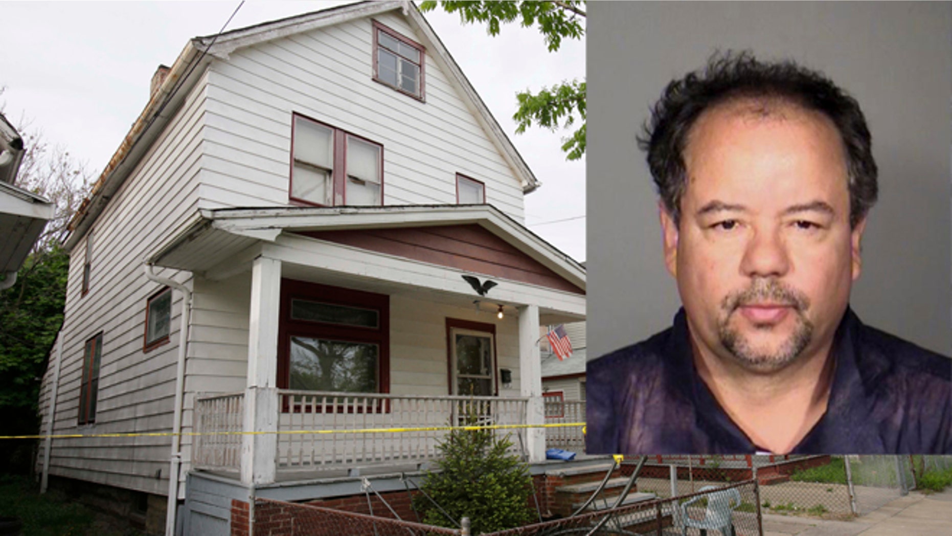 A house where three women escaped is shown Tuesday, May 7, 2013, in Cleveland. Amanda Berry, Gina DeJesus and Michelle Knight, who went missing separately about a decade ago, were found Monday in the home just south of downtown Cleveland and likely had been tied up during years of captivity, said police, who arrested three brothers. (AP Photo/Tony Dejak)