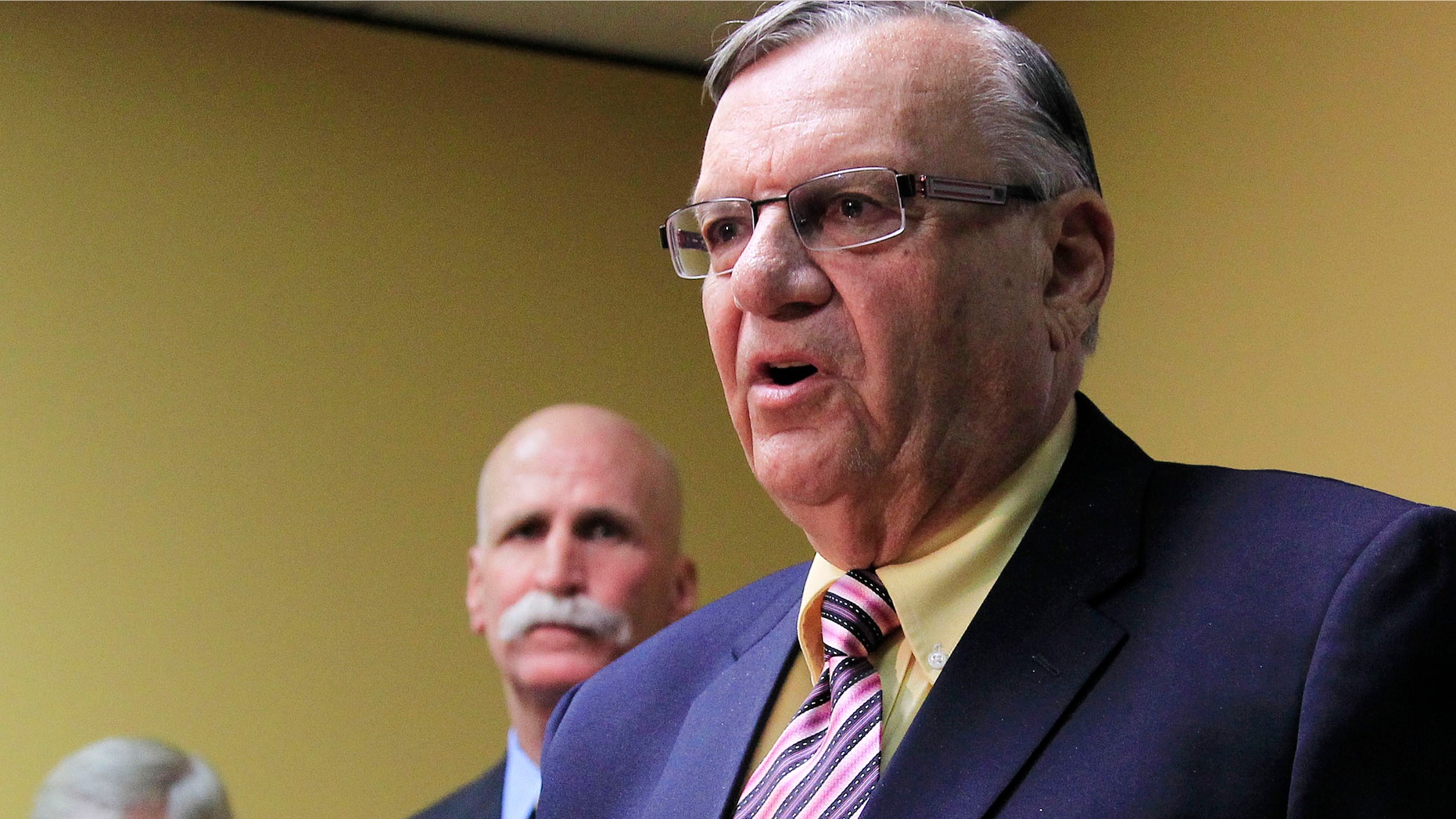 April 3, 2012: Maricopa County Sheriff Joe Arpaio answers questions during a news conference in Phoenix.