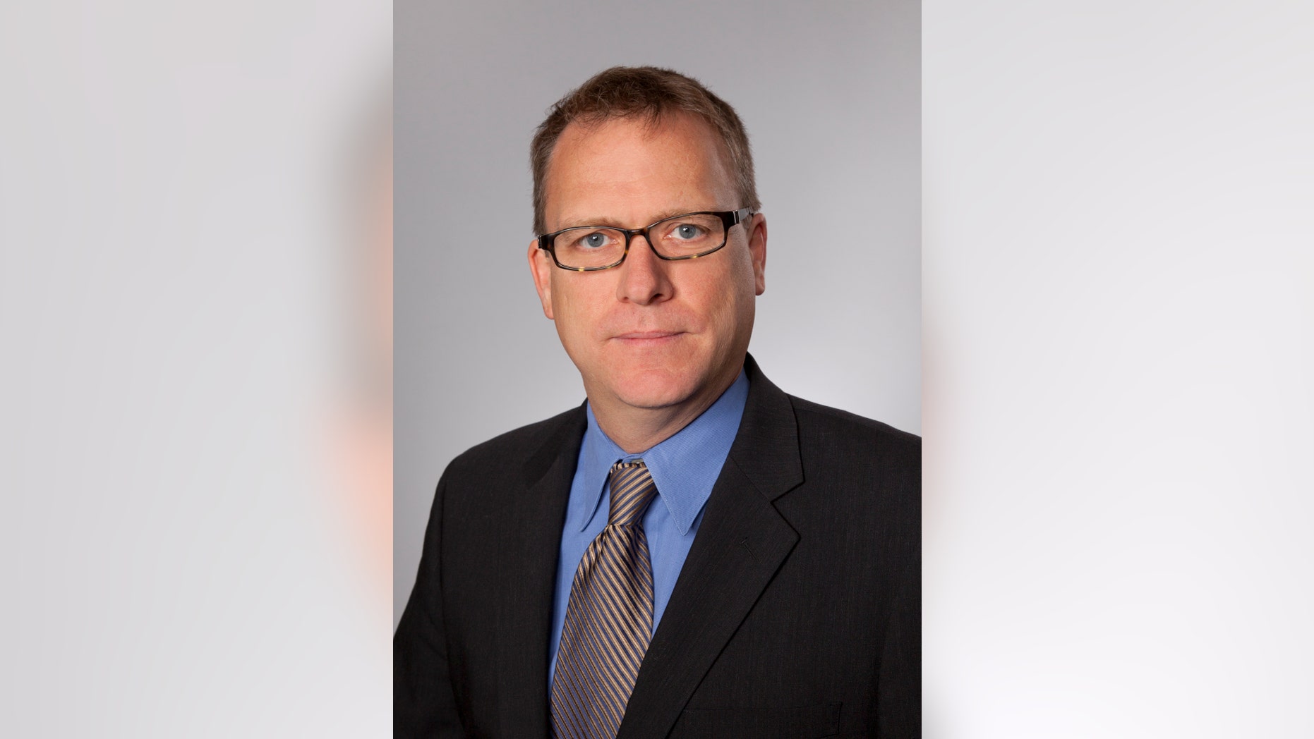 Jan. 30, 2013: This undated photo provided by the Osborn Maledon law firm shows Mark Hummels, who was critically wounded during a shooting at a Phoenix office building.