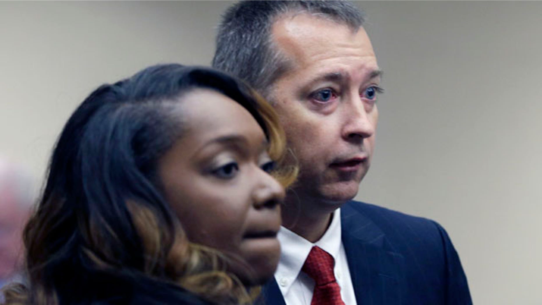 Aug. 14, 2013: Senior Assistant Arkansas Attorney General Warren Readnour, right, and Assistant AG Ka Tina Hodge appear before a meeting of the Arkansas Board of Private Investigators and Private Security Agencies in Little Rock, Ark.