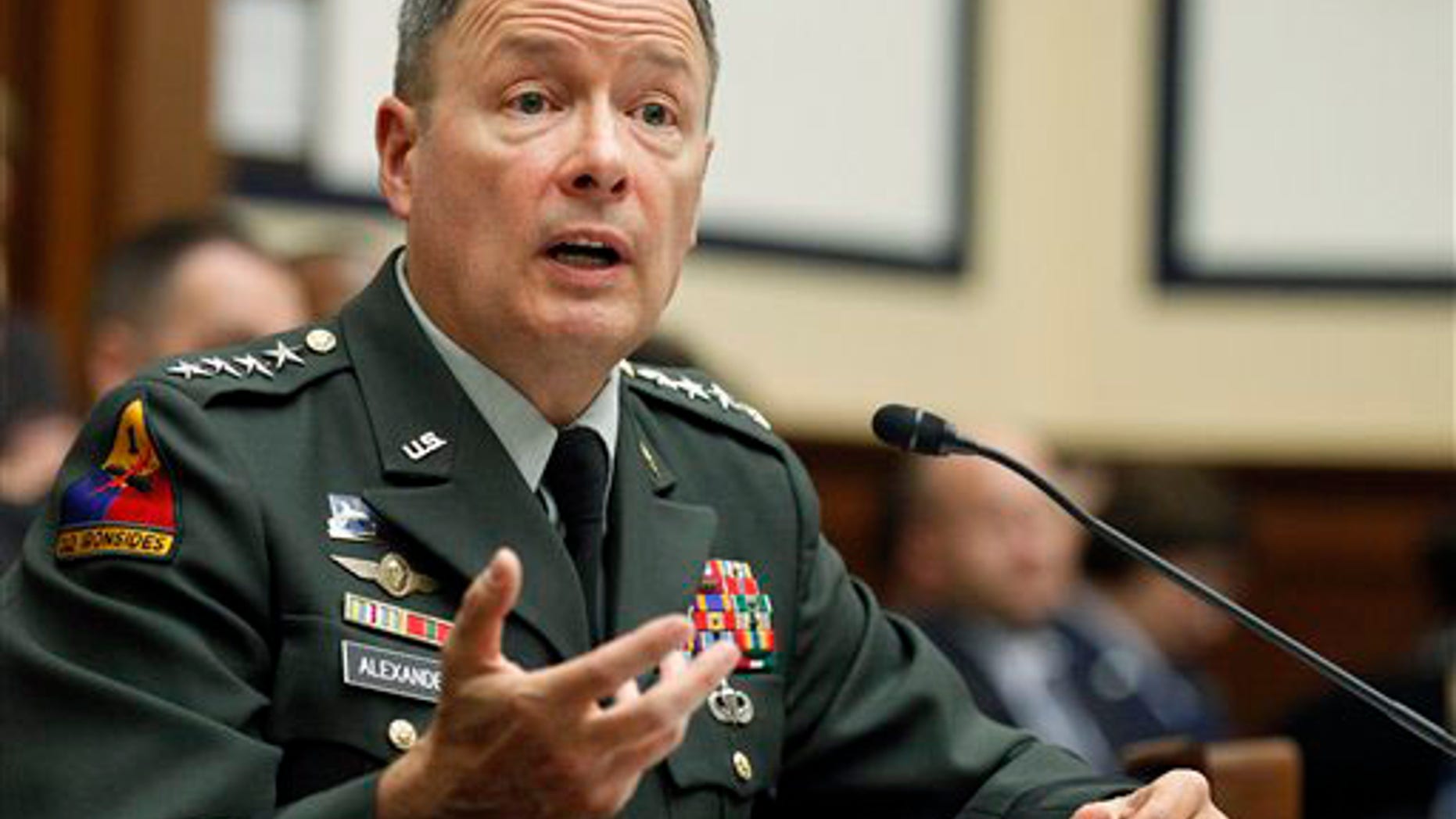 Army Gen. Keith B. Alexander, commander of the U.S. Cyber Command, testifies on Capitol Hill in Washington, Thursday, Sept. 23, 2010, before the House Armed Services Committee hearing on cyberspace operations.