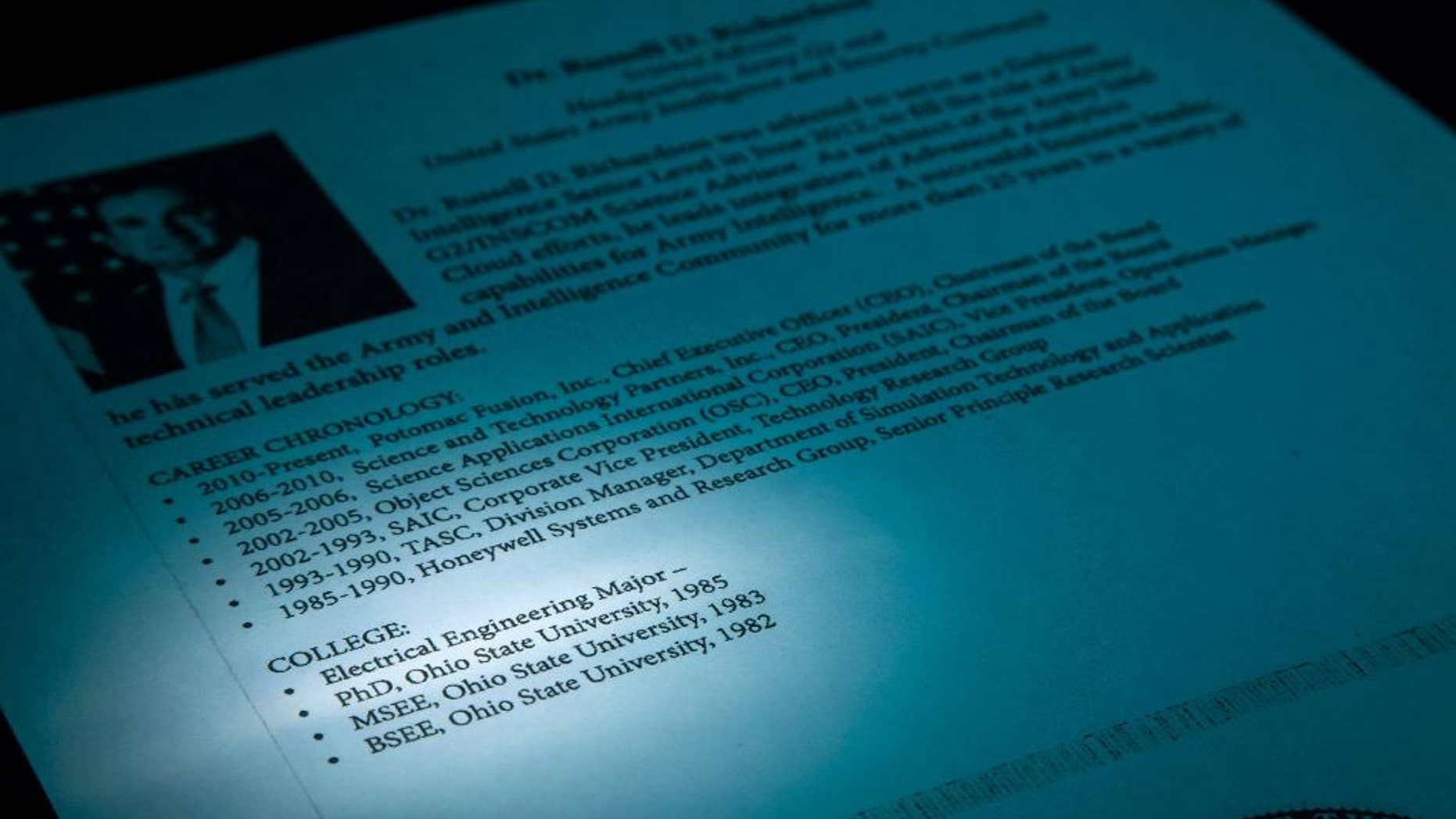 This internal US Army resume acquired by the Associated Press for Russell Richardson says he had a PhD for Ohio State, which he acknowledges he does not have. Richardson says he didn't include the wrong information and doesn’t know who did. Richardson made millions as an Army intelligence contractor before taking a six-figure federal job in 2012 as science adviser to the Army’s intelligence and security command, or INSCOM. Before he left the government in July, he was the architect of a failed effort to fix the Army’s Distributed Common Ground System, a troubled intelligence fusion program. (AP Photo)