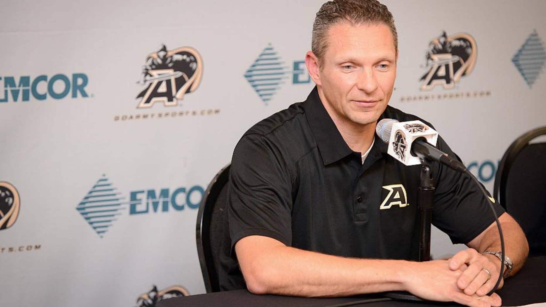 Army football head coach Jeff Monken speaks at a press coference on Tuesday, Oct. 28, 2014, in West Point, N.Y. Monken addressed his team's reported recruiting violations and the upcoming game against Air Force. (AP Photo/Steve Borland)