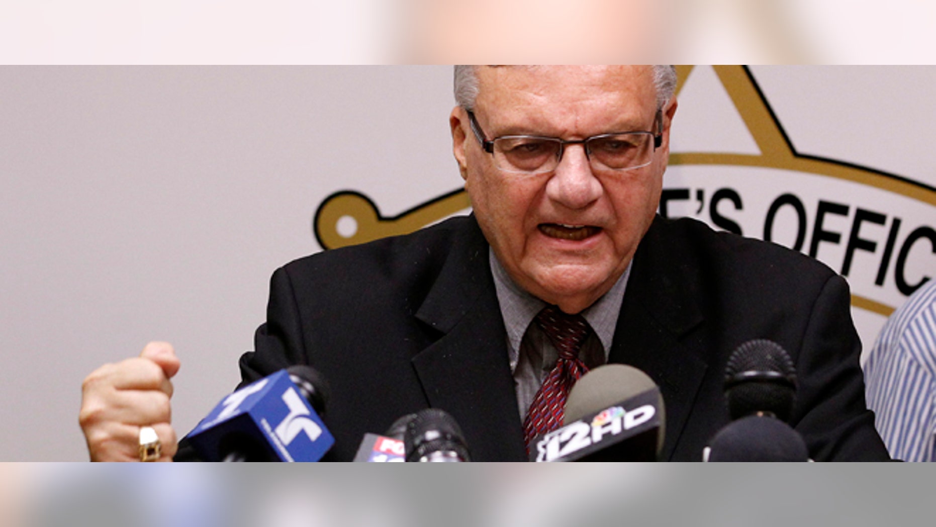 May 10, 2012: Maricopa County Sheriff Joe Arpaio, pounds his fist on the podium as he answers questions.