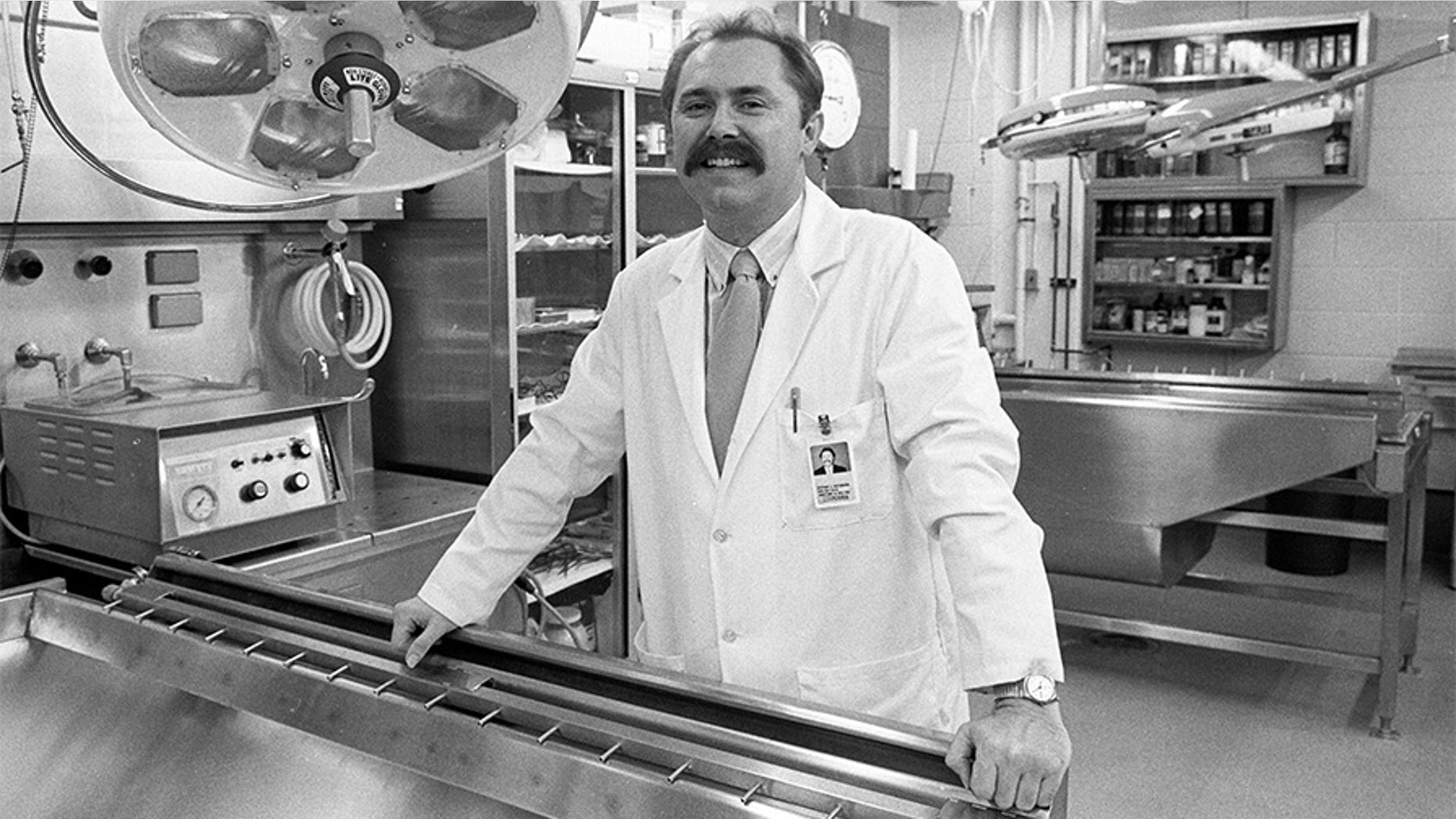 Federal authorities reportedly discovered four preserved fetuses in the Detroit warehouse of Arthur Rathburn, pictured here at the University of Michigan in Ann Arbor in November 1988.